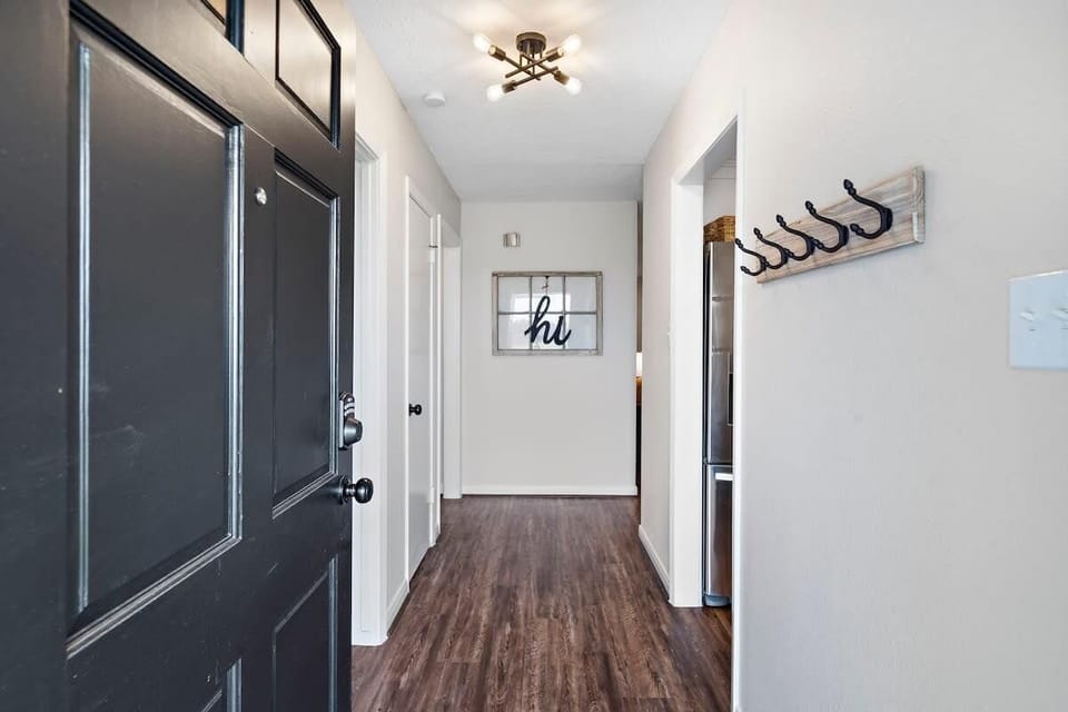 Entryway: Step inside to a stylish welcome with modern lighting and inviting decor.