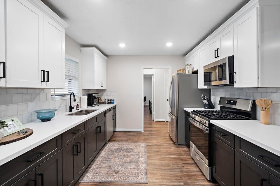 Spacious Gourmet Kitchen: Cook up delightful meals with modern appliances and elegant finishes!