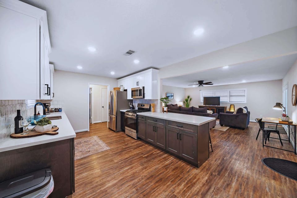 Spacious Kitchen & Living Area: Enjoy seamless entertaining with modern appliances & stylish decor.