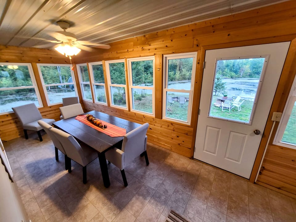 Front Screened in porch.  Large stand up freezer not shown