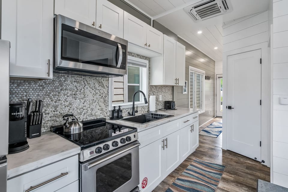 Ample counter space, a Keurig, and a full set of cookware