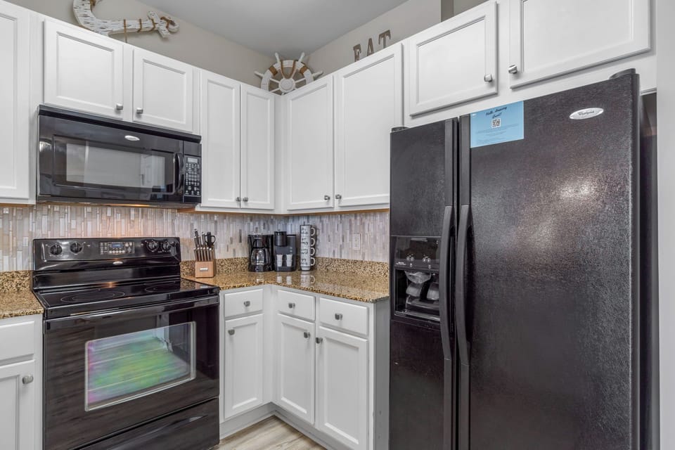 Spacious kitchen with all of the comforts of home, Refrigerator w/ Ice and water