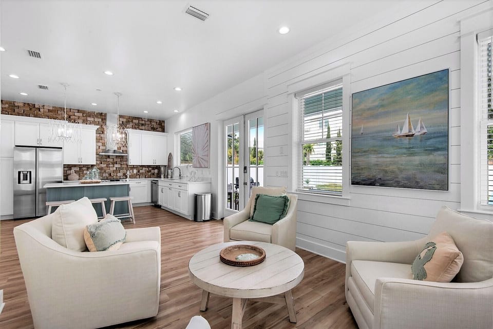 The open concept kitchen ensures that the chef doesn't miss out on all the fun!