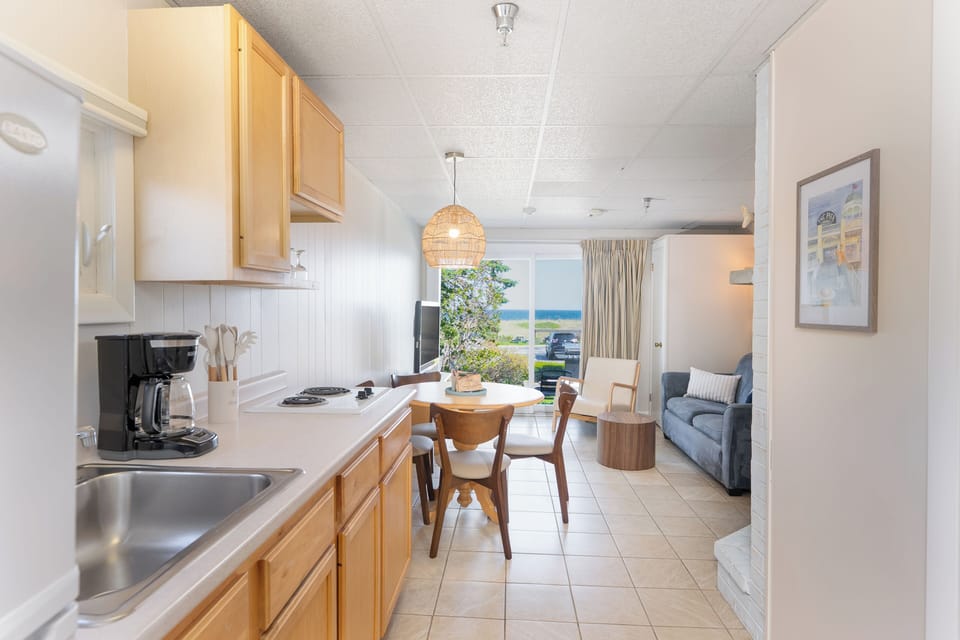 Oceanview King Suite | Private kitchenette | Coffee/tea maker, dining tables