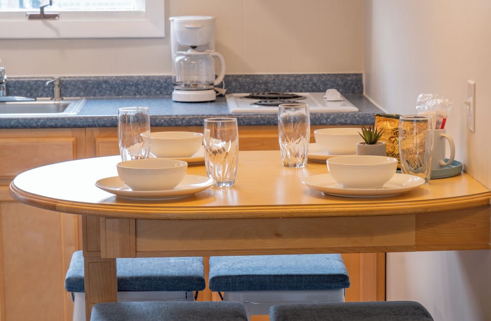 Oceanview Studio | Private kitchen | Coffee/tea maker, dining tables