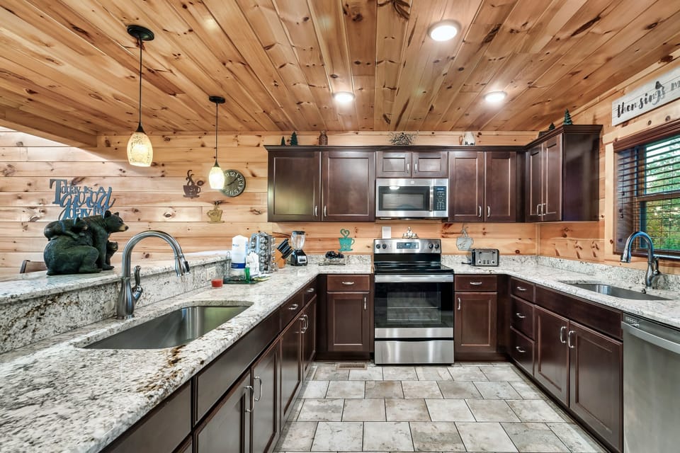 Large stocked kitchen with two sinks