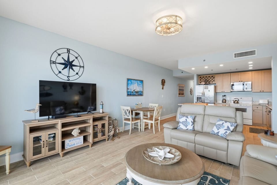 Living Area with Lake Views, Direct Balcony Access,  Sleeper Sofa and Flat Screen TV