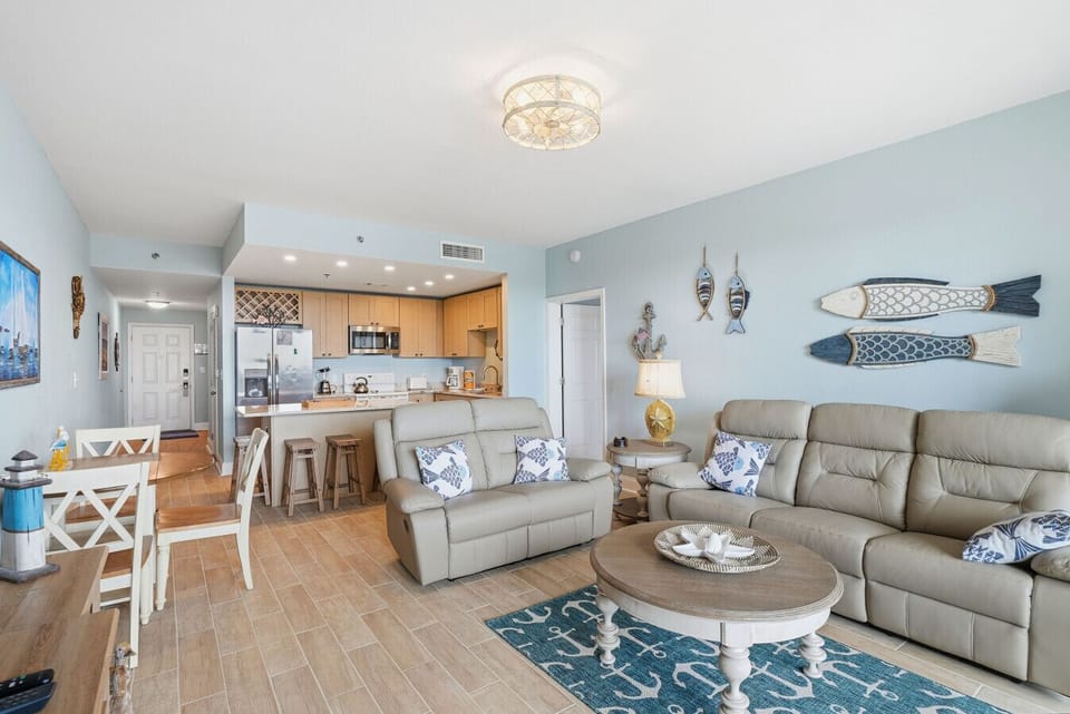 Living Area with Lake Views, Direct Balcony Access,  Sleeper Sofa and Flat Screen TV