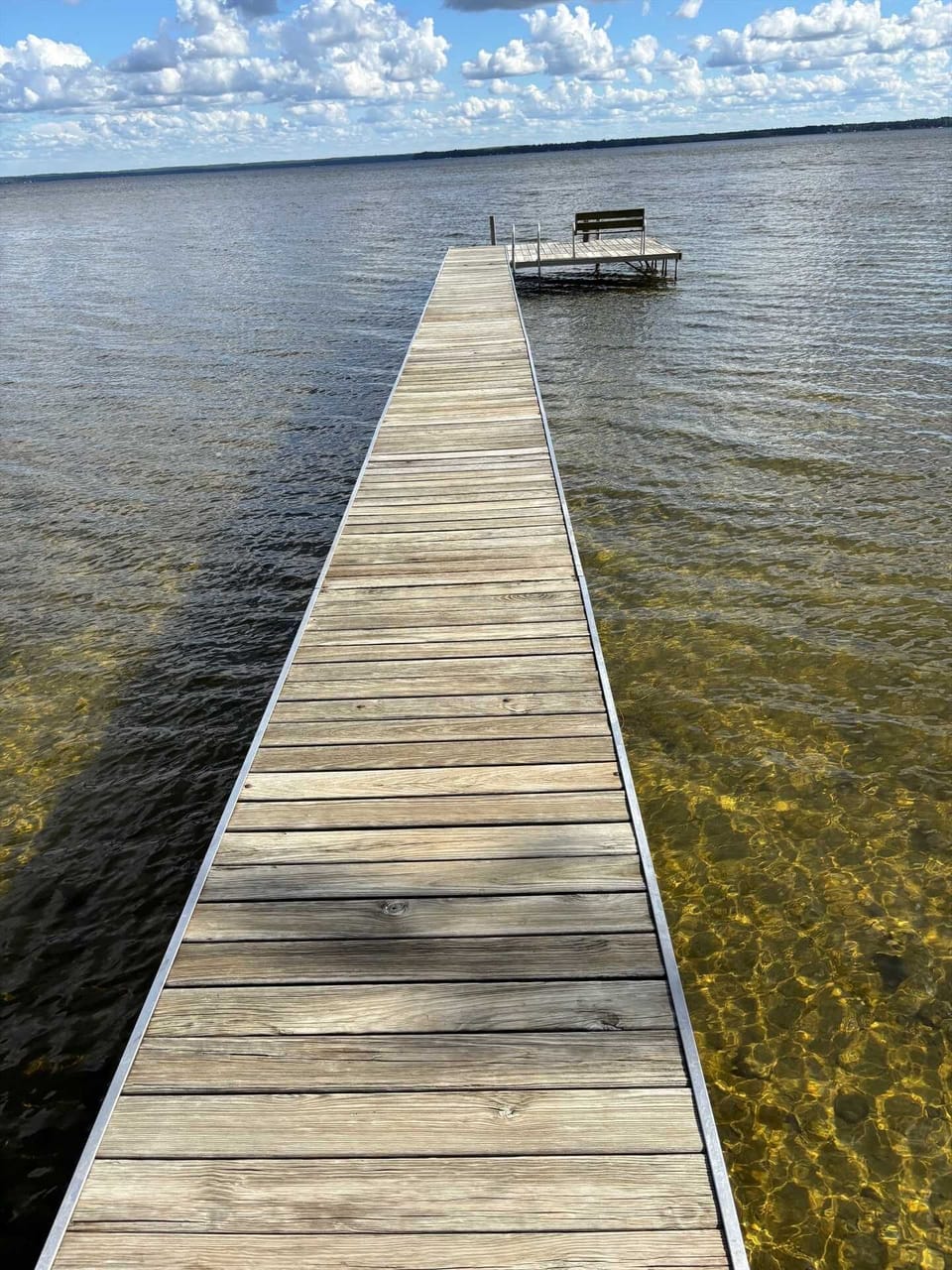 Options for docking your boat.  The dock is 70 feet long.  Water is about 2 feet deep.   Use your judgement based on whether it is OK to dock or safer to moor your boat.