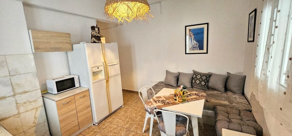 Family Apartment | Private kitchen | Fridge, microwave, coffee/tea maker, dining tables