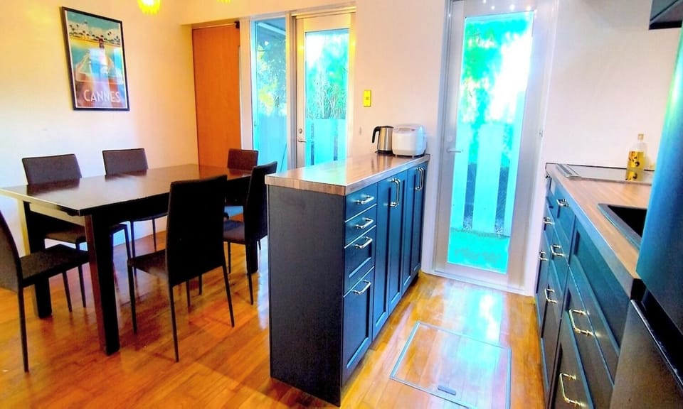 The living/dining room is equipped with a work table, so you can enjoy cooking together with your children and family.