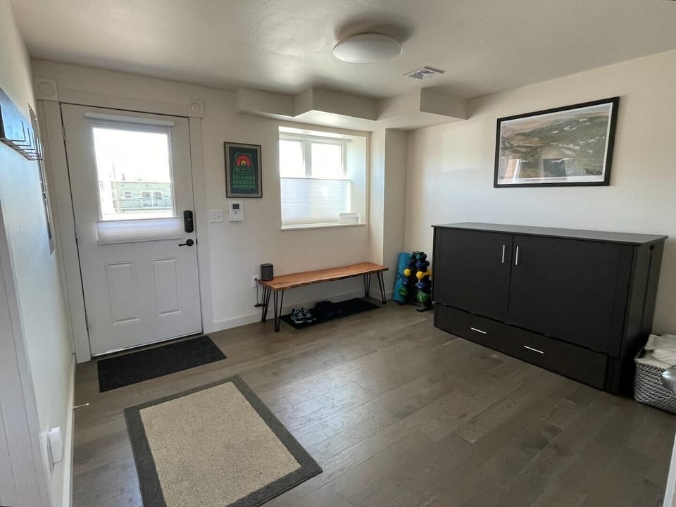 Queen murphy bed cabinet in back room 
