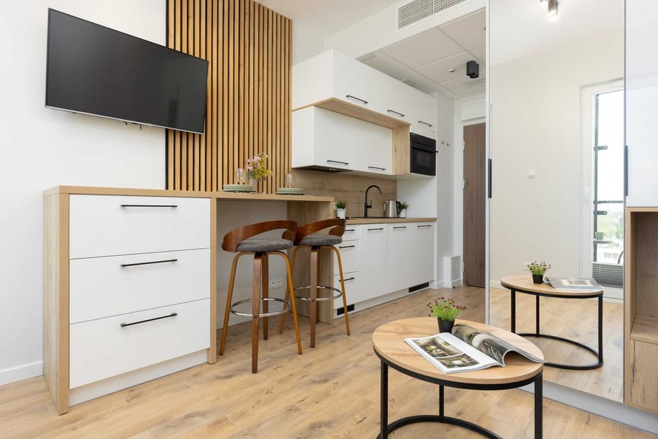 The living area's decor combines elegance with functionality. 