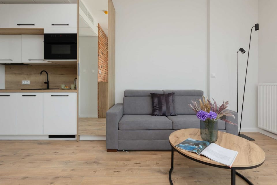The living area's beautiful design complemented by natural light streaming in.