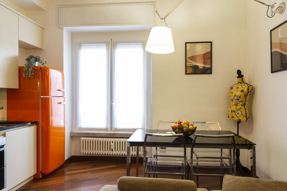 Deluxe Apartment | Living area | Flat-screen TV