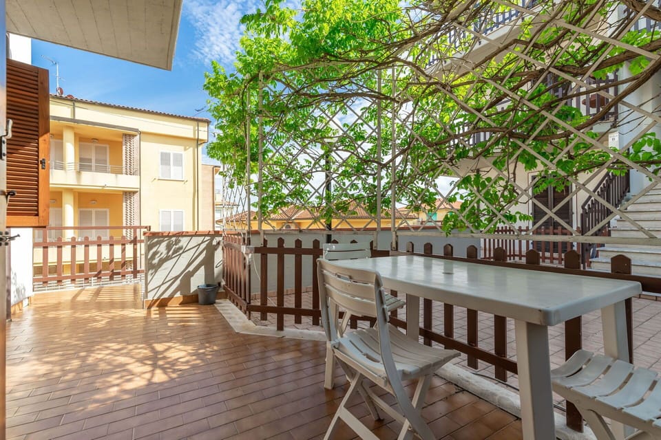 Furniture, Table, Building, Wood, Interior Design, Floor, Wood Stain, Sky, Tree, Outdoor Furniture