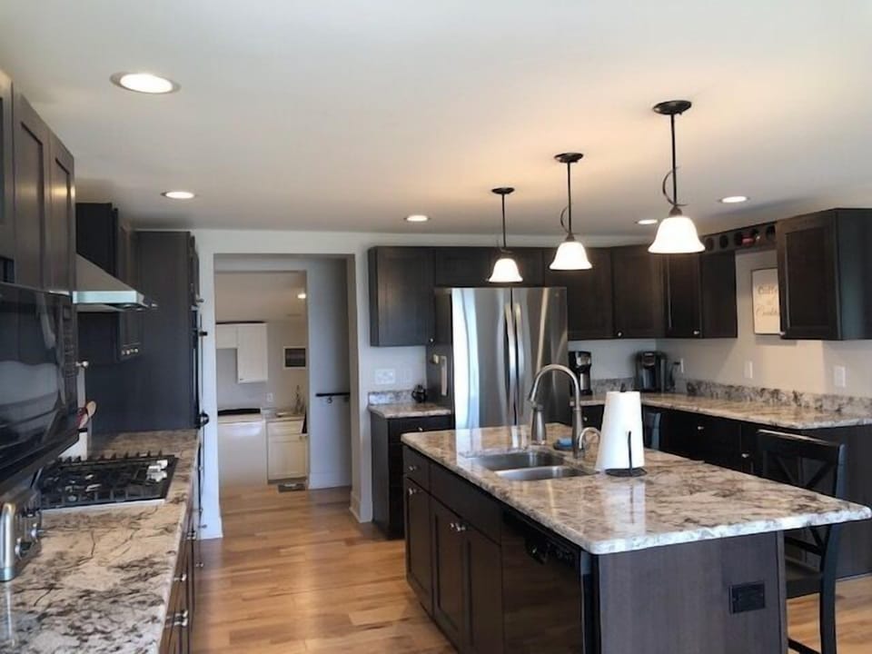 Kitchen - Spacious, newly remodeled kitchen with gas range and stainless steel appliances.