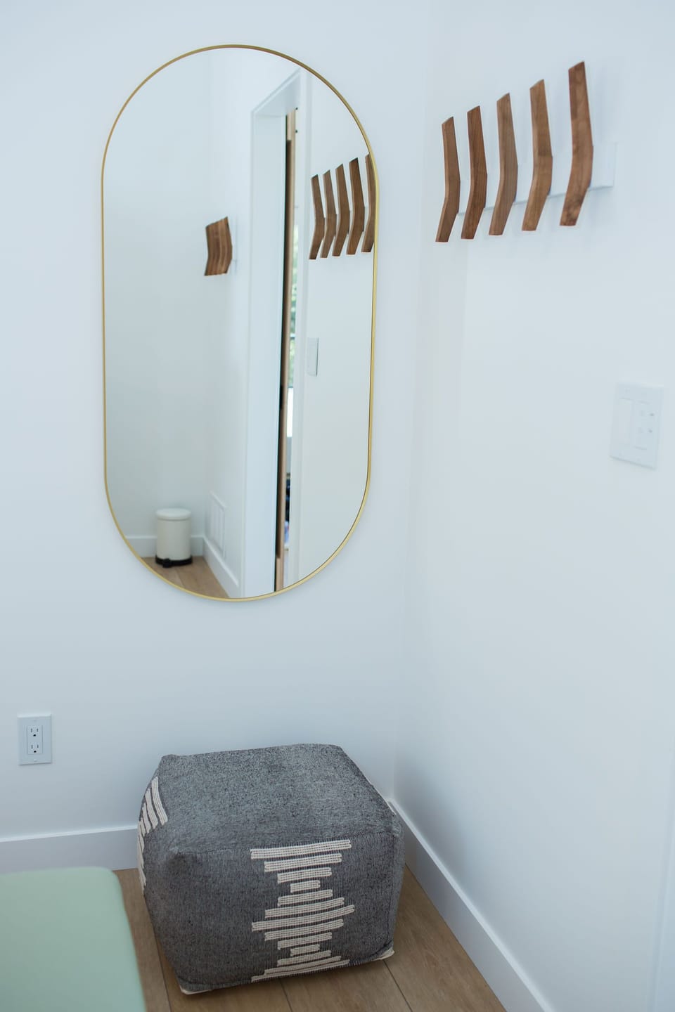 A full length mirror and puff are available to make another area for getting ready in the morning. 