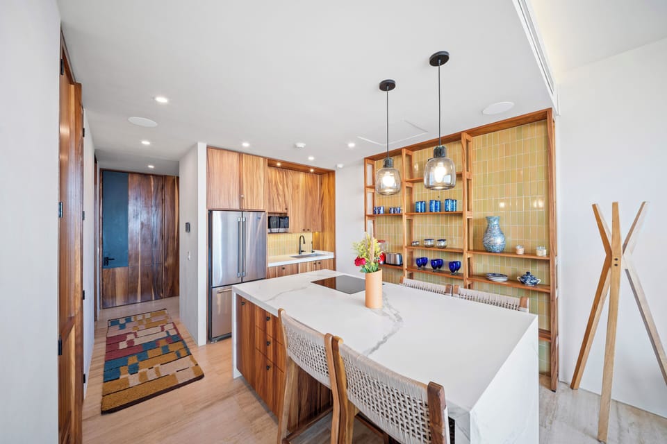 Deluxe Suite, 2 Bedrooms | Private kitchen | Fridge, microwave, stovetop, coffee/tea maker