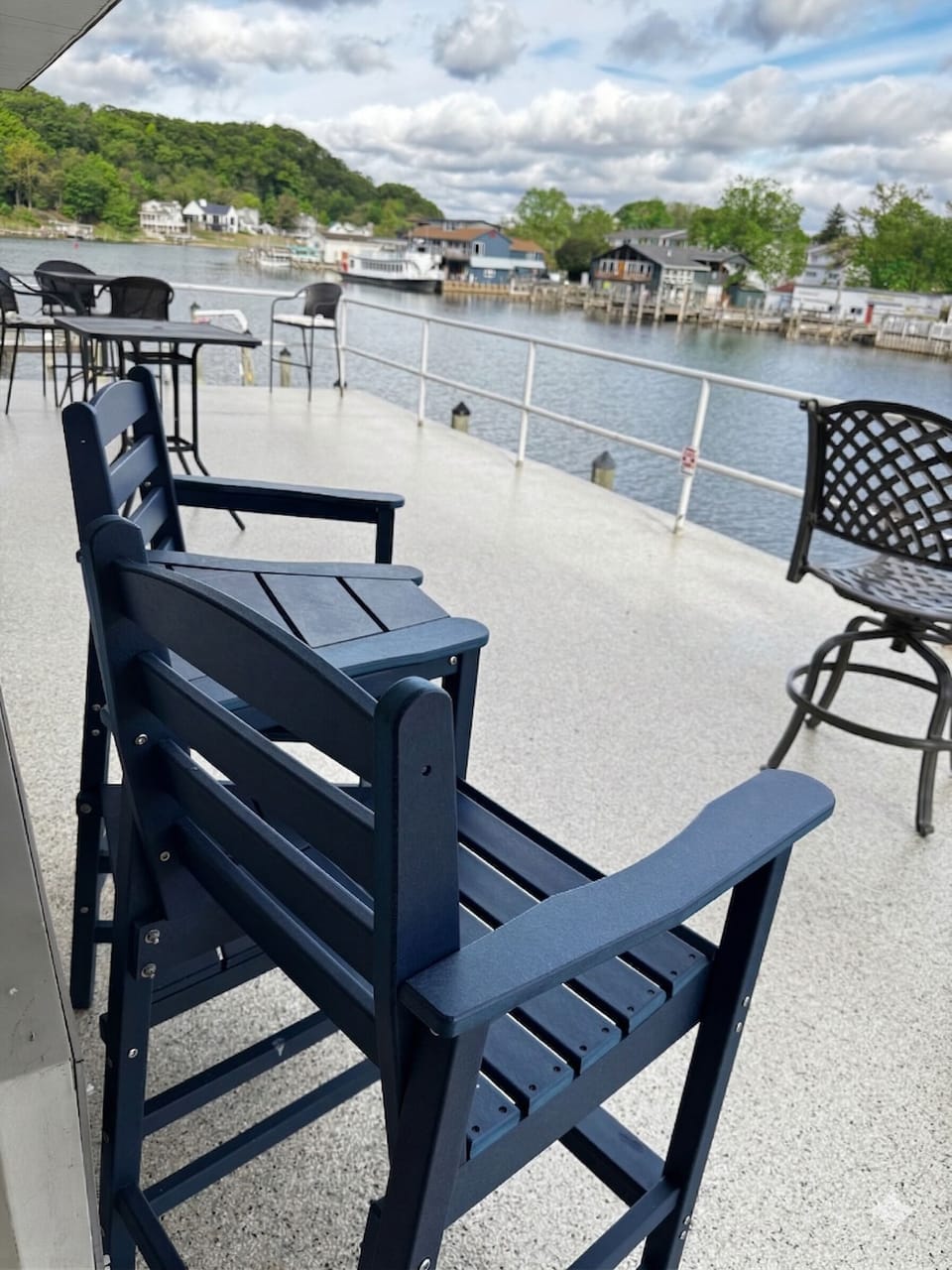 Literally on the water, your private chairs an the shared deck
