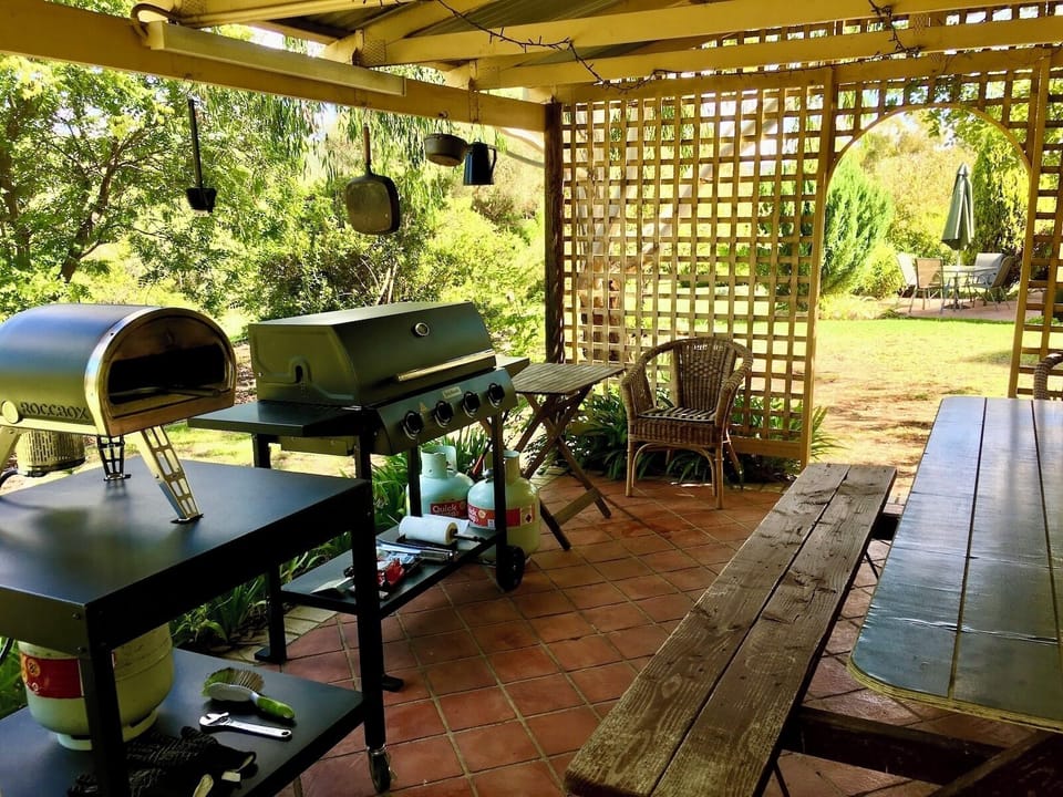 Shared Gazebo with Gas BBQ, Roccbox Pizza Oven and Large Picnic Table