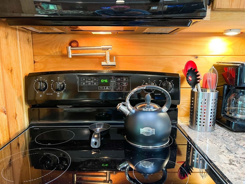 Stove top, kettle and pot-filler faucet