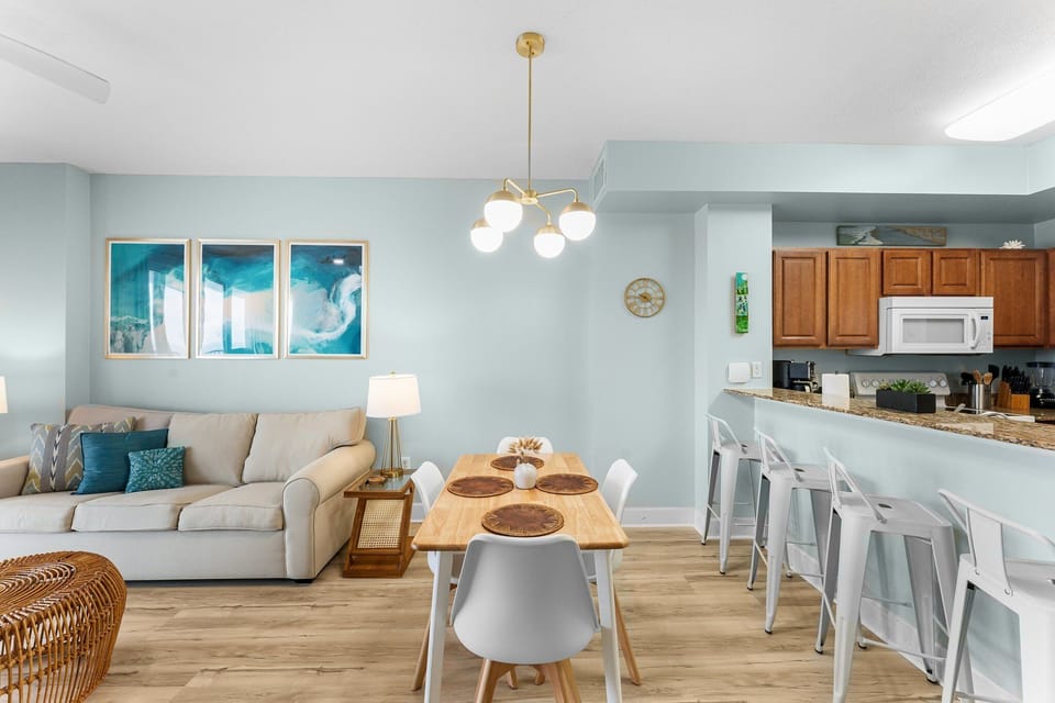Dining area with coastal touches and light-filled space
