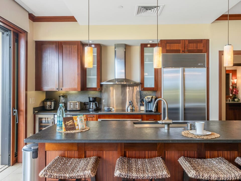 Fully equipped kitchen with stainless steel appliances