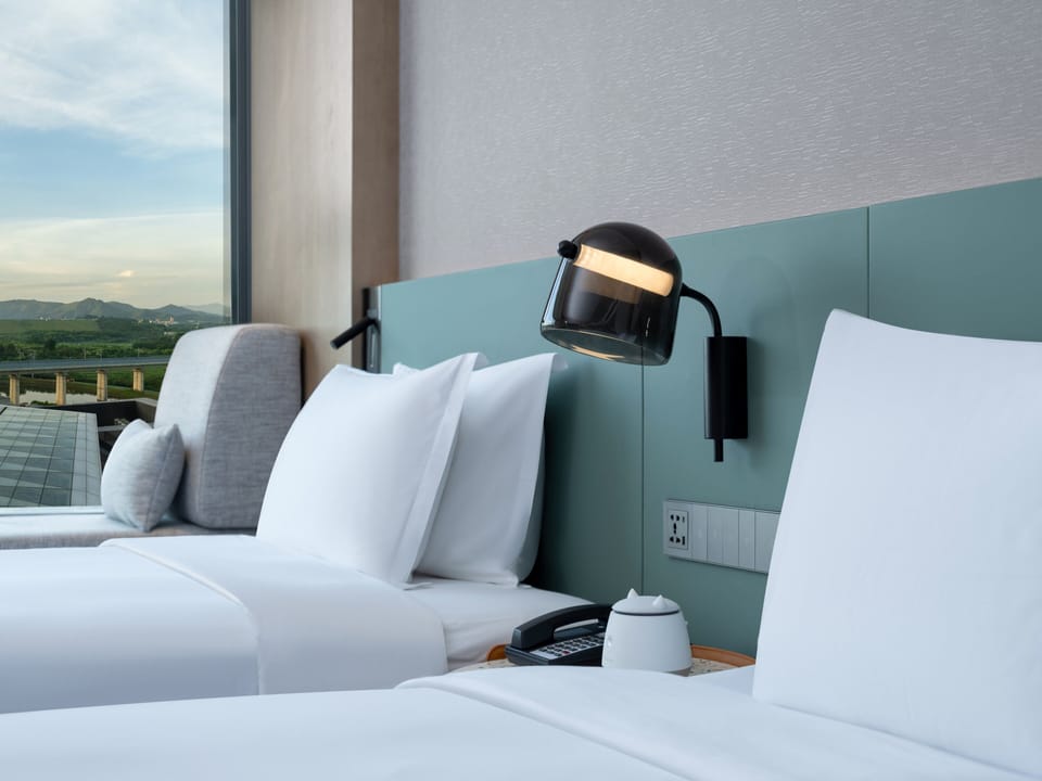 Standard Room, 2 Twin Beds | Down comforters, in-room safe, desk, laptop workspace