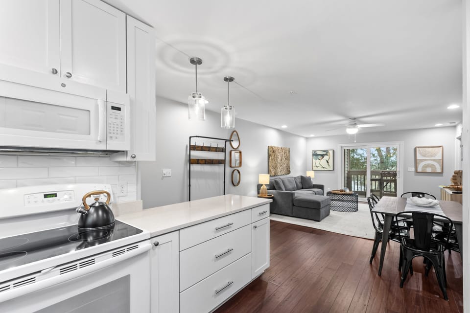 The kitchen is open to the main living space of this villa