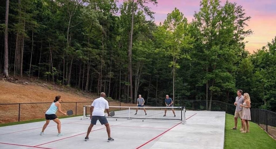 The communal pickleball court is a short drive from Treetop Escapes