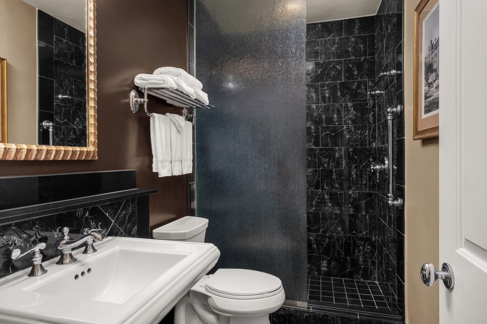 Shower, eco-friendly toiletries, hair dryer, bathrobes