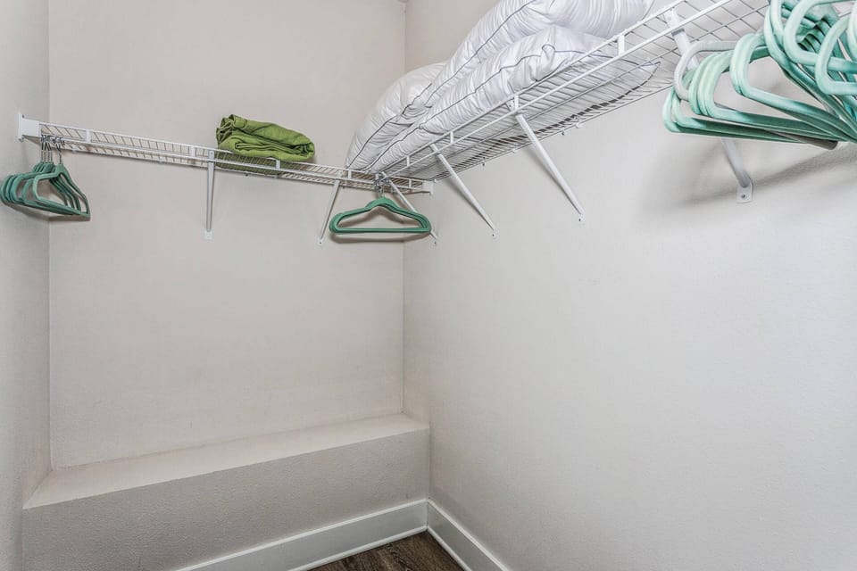 Plenty of storage for your luggage and belongings  in the master closet