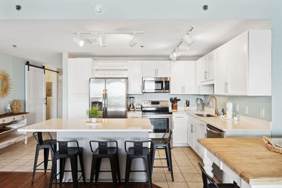 Fully Stocked Kitchen with Lake Views, Island Bar Seating, Keurig and Stainless Steel Appliances