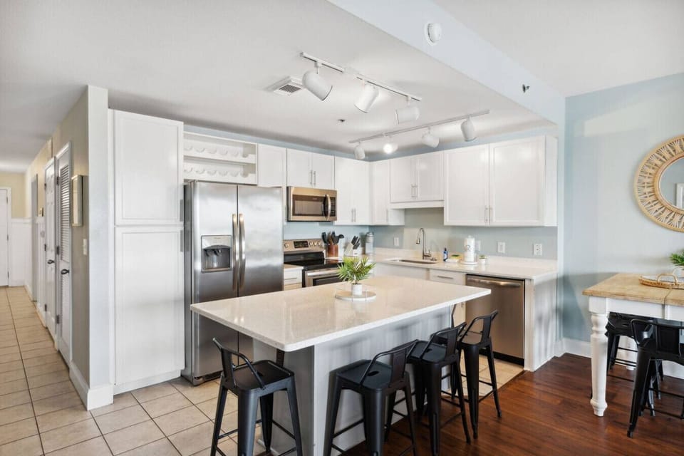 Fully Stocked Kitchen with Lake Views, Island Bar Seating, Keurig and Stainless Steel Appliances