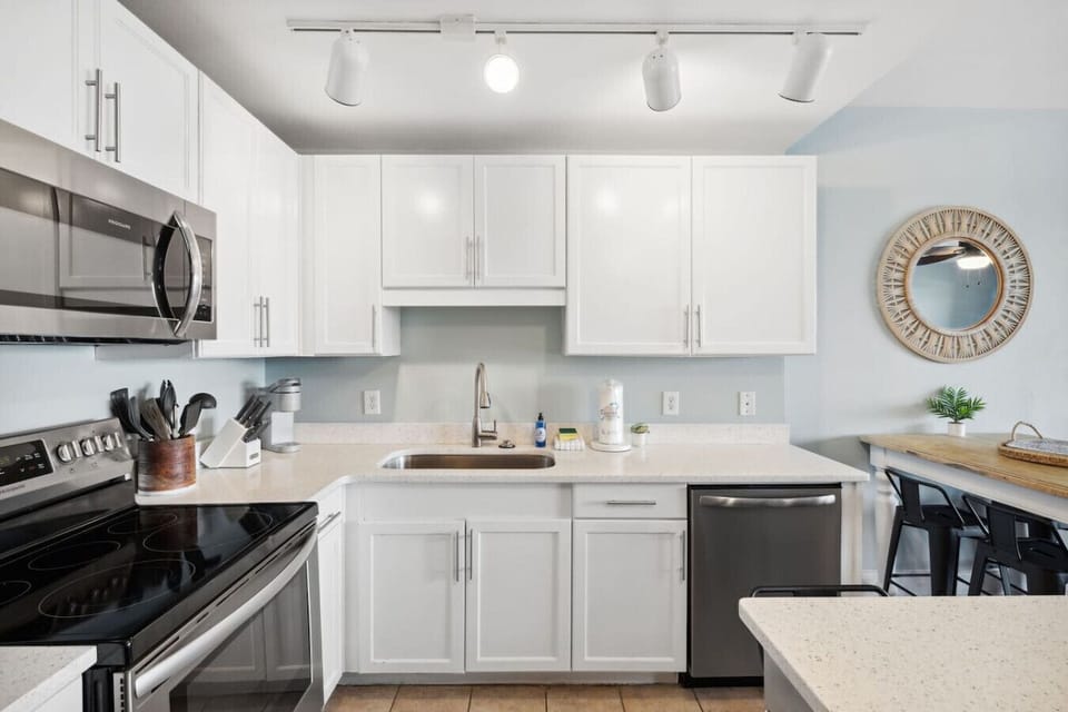 Fully Stocked Kitchen with Lake Views, Island Bar Seating, Keurig and Stainless Steel Appliances