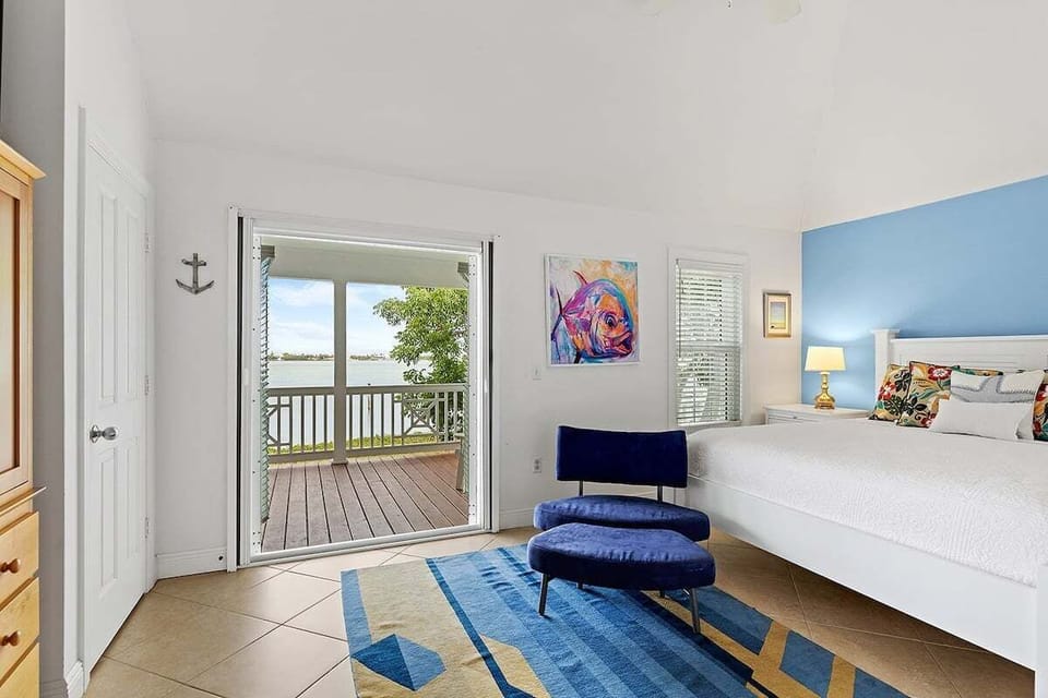 King bed in the 2nd level master bedroom with private porch.