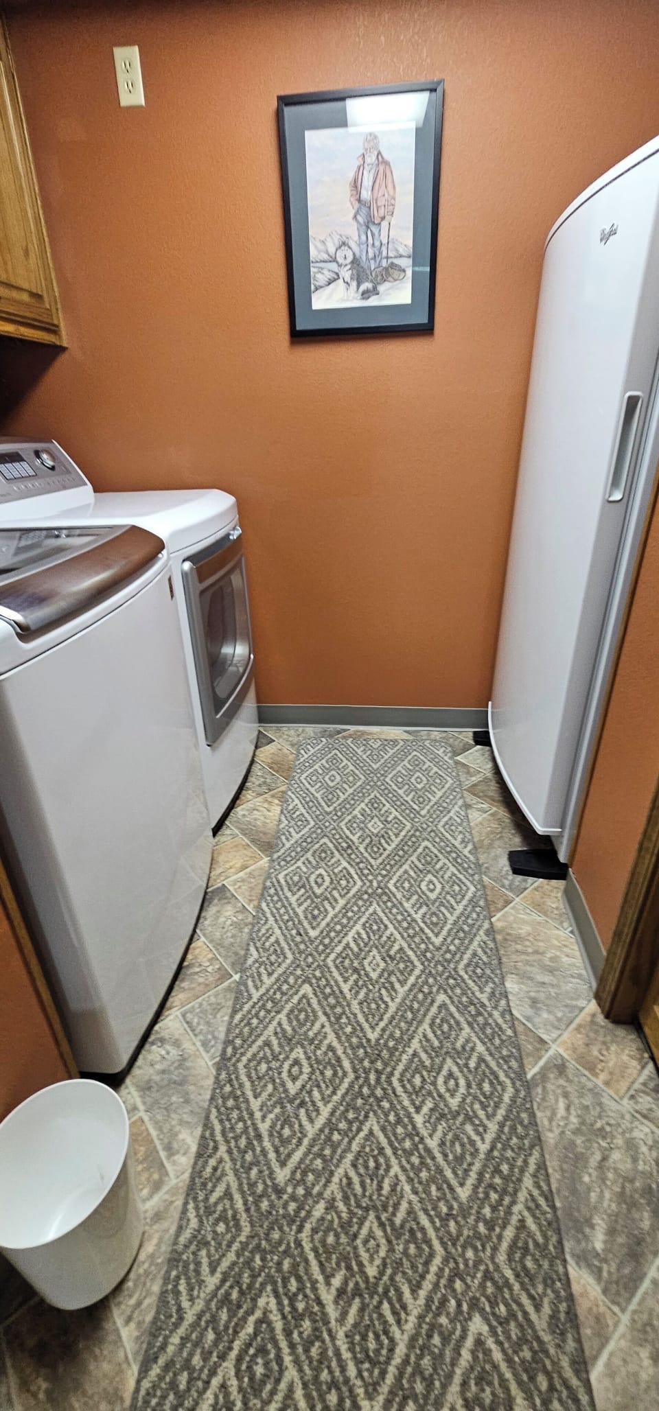 Lower-level washer - dryer and chest freezer
