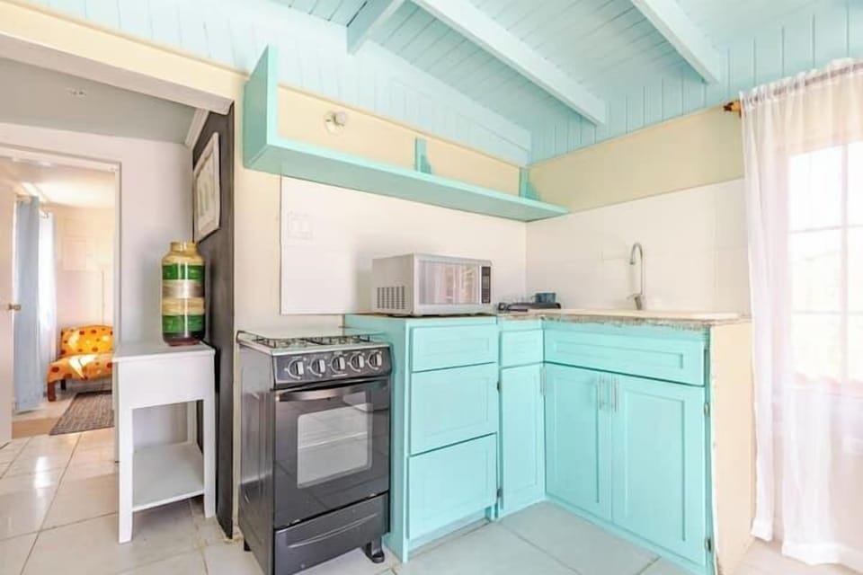 Basic Double Room, 1 Queen Bed | Private kitchen