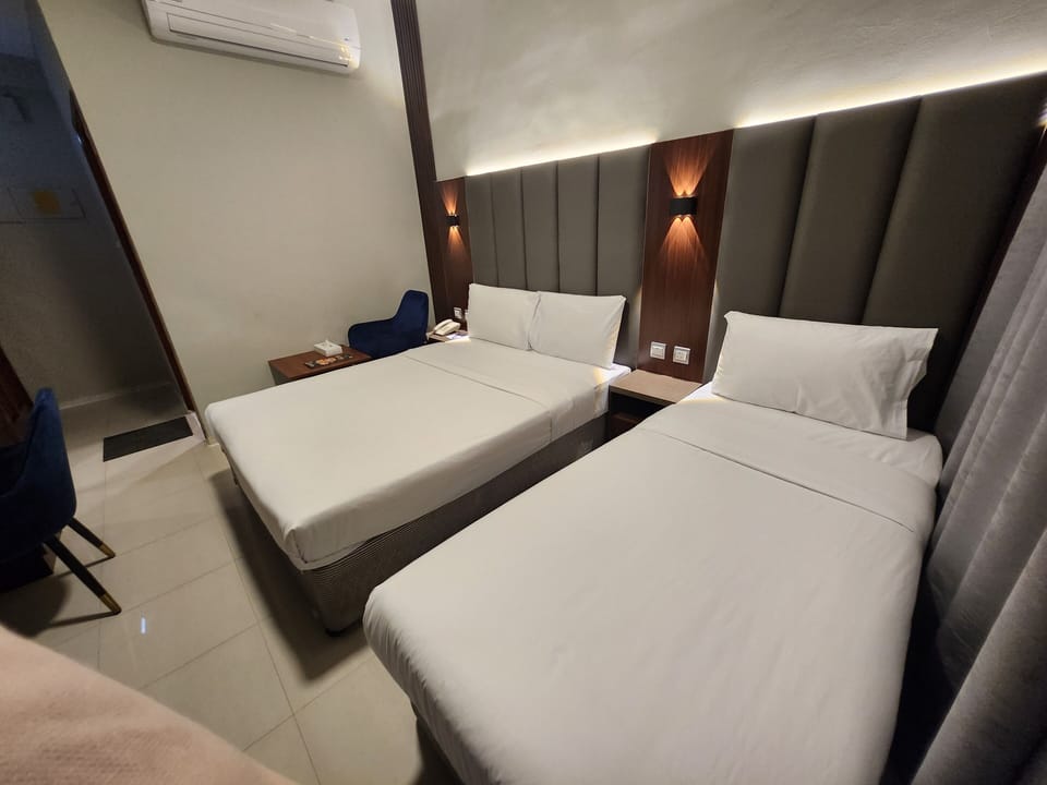 Family Twin Room | Minibar, desk, soundproofing, iron/ironing board