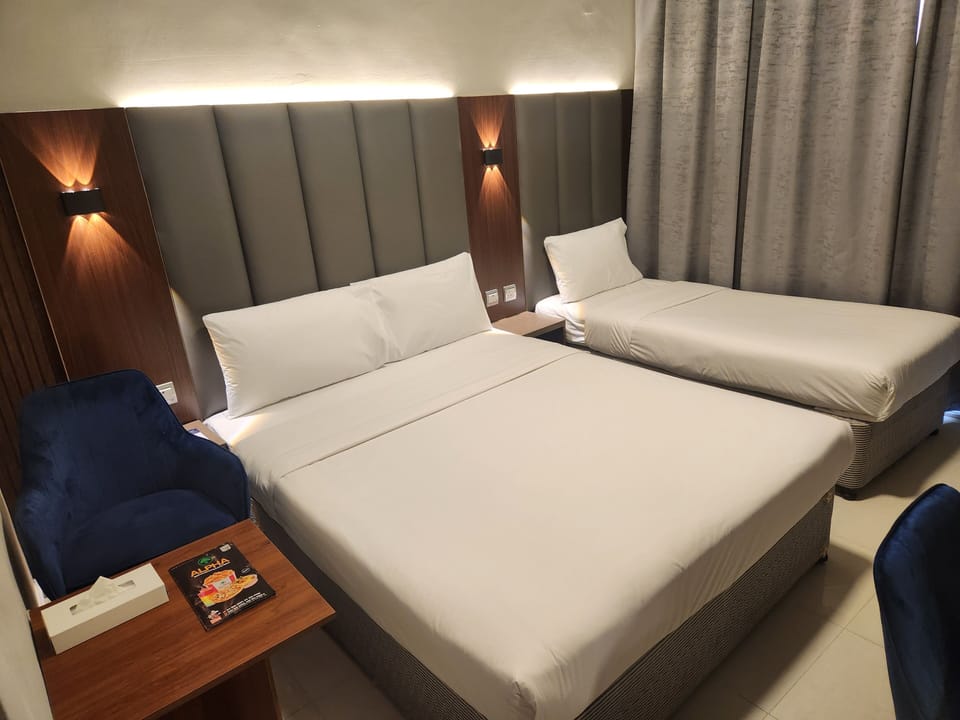Family Twin Room | Minibar, desk, soundproofing, iron/ironing board