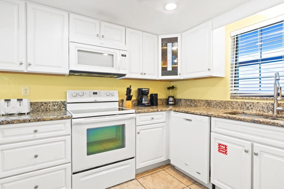 A spacious kitchen with everything you need, whether you're whipping up a quick breakfast or a family dinner.