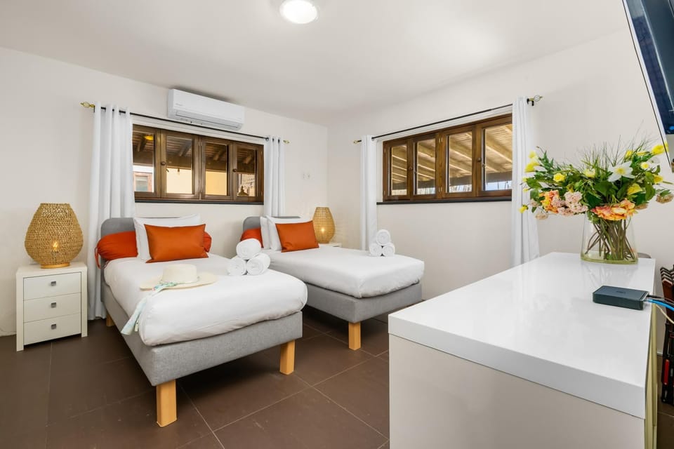 Bedroom 3 (3rd Floor): European single beds, shared bathroom with BR #3.