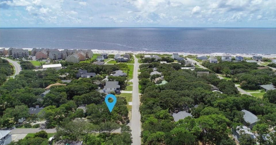 Aerial View of House to Beach