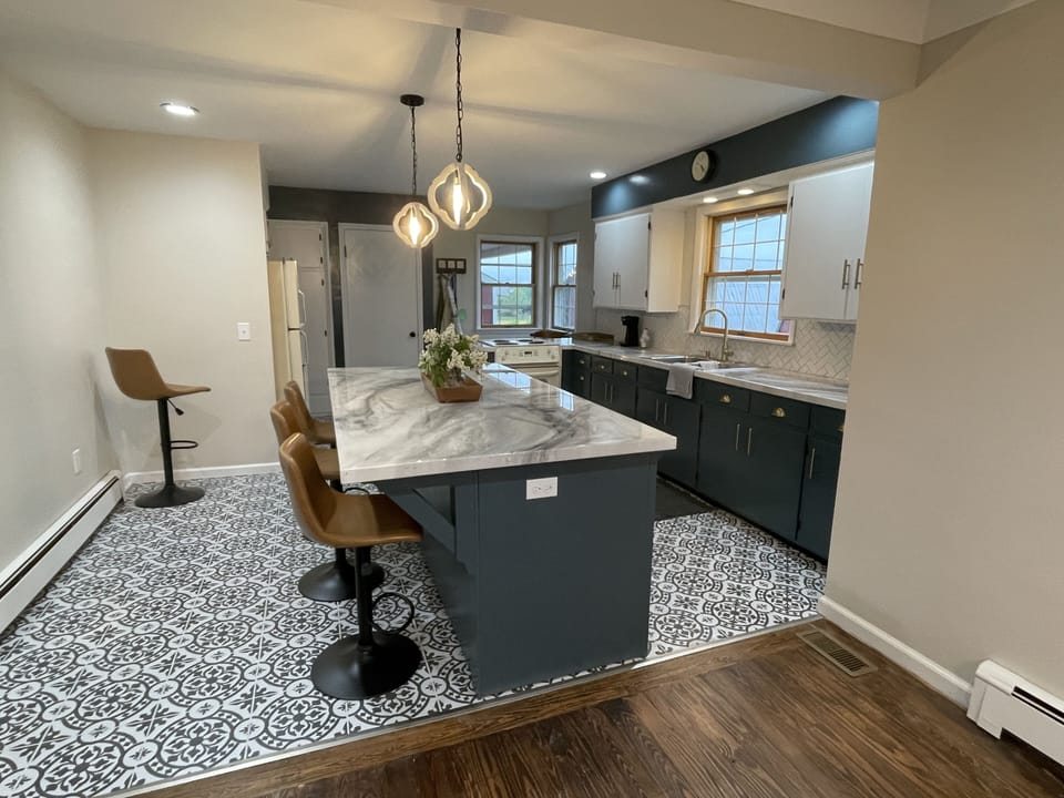 Kitchen with additional seating and dishwasher 