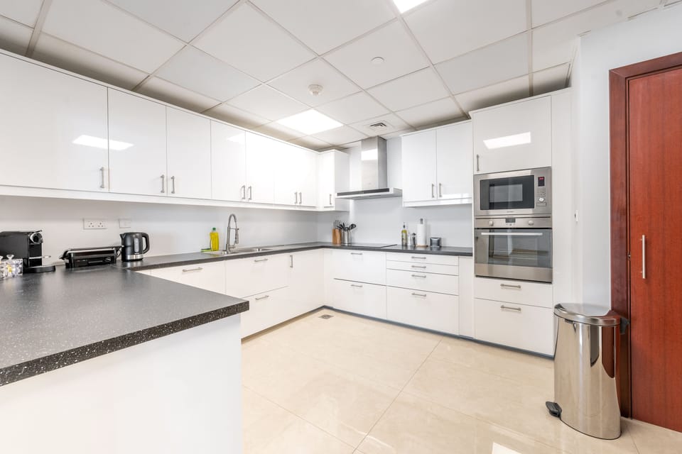 Exclusive Apartment, 3 Bedrooms, Sea View, Beachfront | Private kitchen | Full-size fridge, microwave, oven, stovetop
