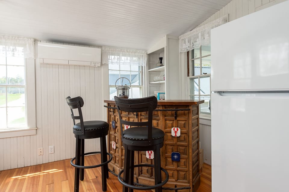 Corner bar with one of five heat pumps in the house
