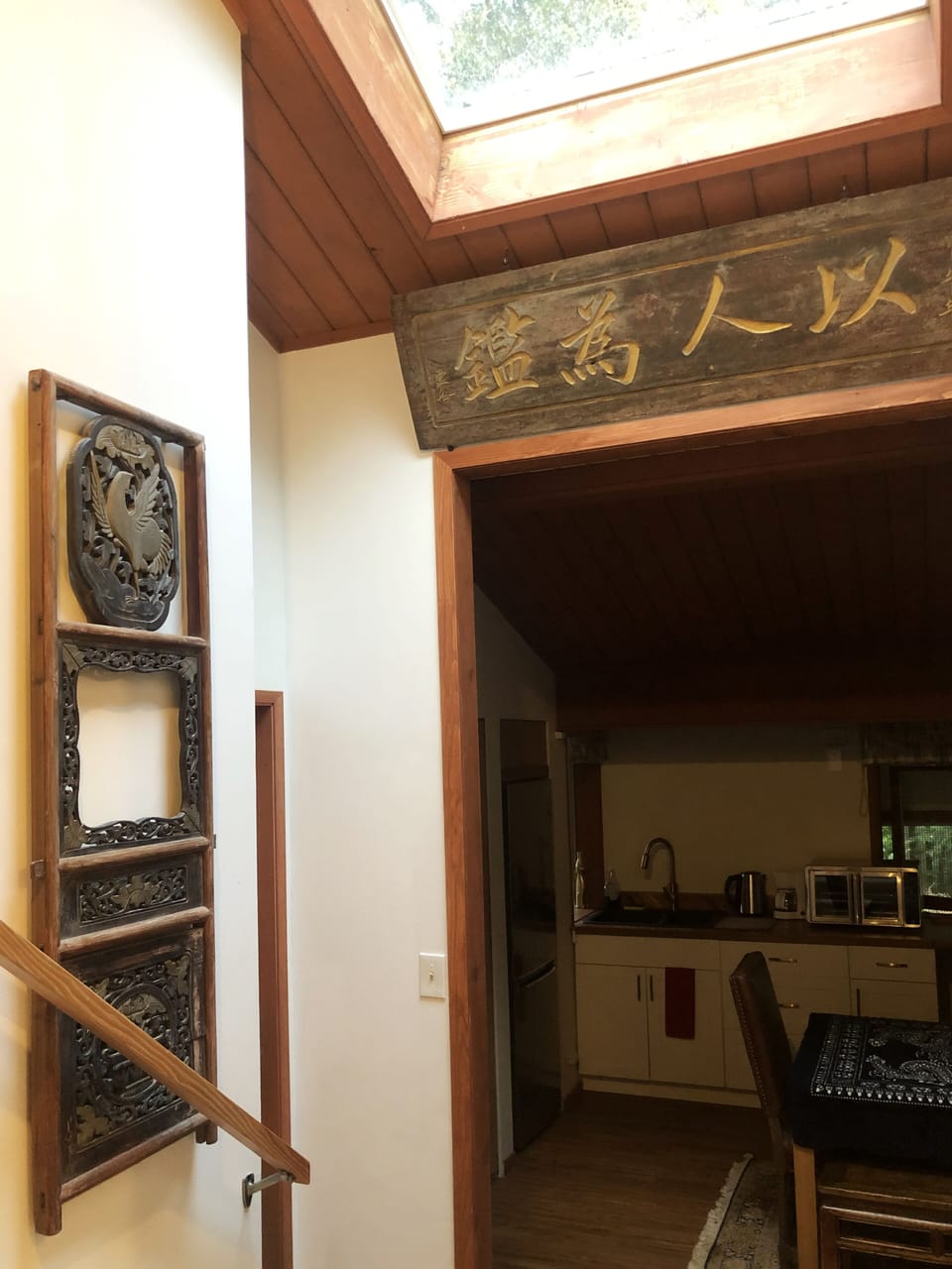 Antique architectural collections around the hallway stairs. 