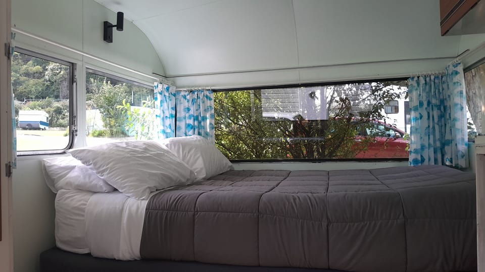 Small Caravan for 2 with Child | Iron/ironing board, free WiFi, bed sheets