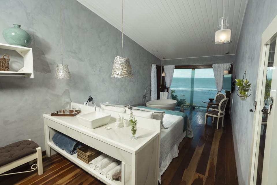 Junior Suite | Minibar, in-room safe, blackout drapes, free WiFi